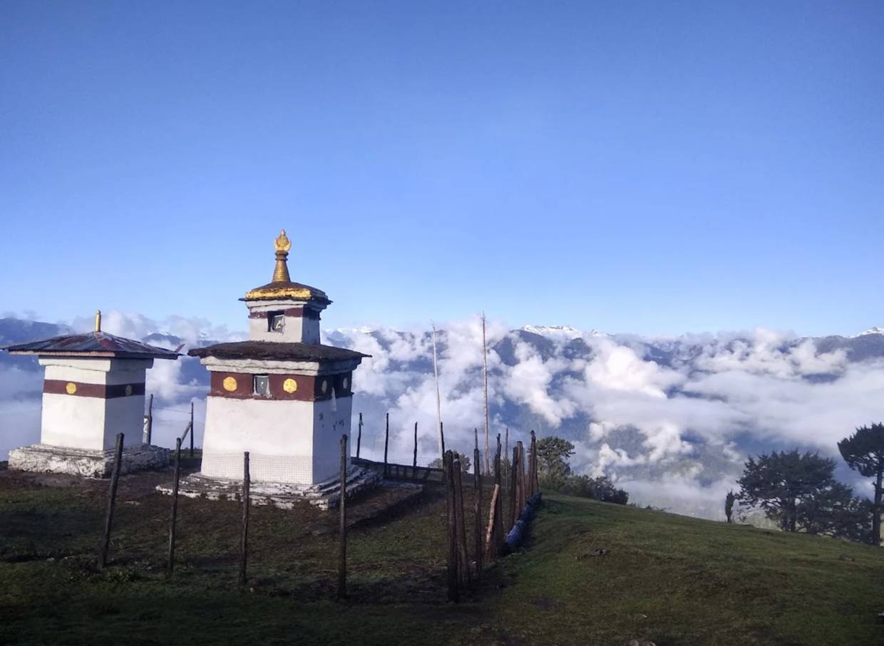 Bumdrak Monastery is a sacred Bhutanese Buddhist site steeped in legend and spiritual significance. According to tradition, Guru Padmasambhava and his consort Yeshe Tsogyel blessed this place in the 8th century, and the cliff below the temple is said to bear the rare imprints of 100,000 dakinis—female spirits of enlightenment—giving the site its name, Bumdrak, meaning “hundred thousand footprints.”